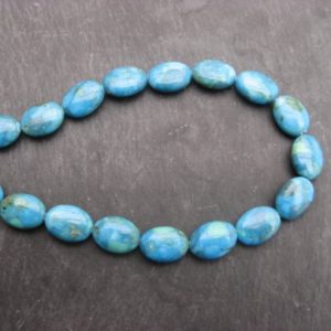Turquoise perles ovales plates de 14 mm