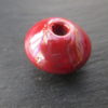 Perle céramique toupie rouge 18 mm