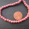 perles ceramiques rose de 6 mm